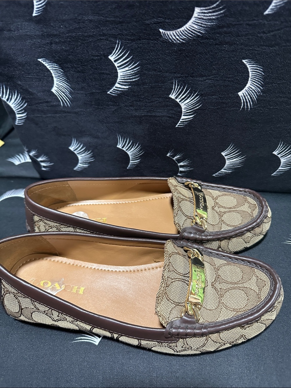 Coach Women's Signature Canvas Brown Loafers with Gold Accent